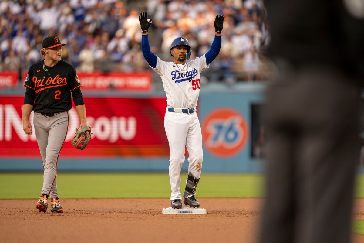 Los Angeles Dodgers infielder Mookie Betts (50) celebrating hitting a double during an MLB baseball game against the Baltimore Orioles on June 19th, 2026 in Los Angeles, CA. Los Angeles Dodgers infielder Mookie Betts (50) celebrating hitting a double during an MLB baseball game against the Baltimore Orioles on June 19th, 2026 in Los Angeles, CA.