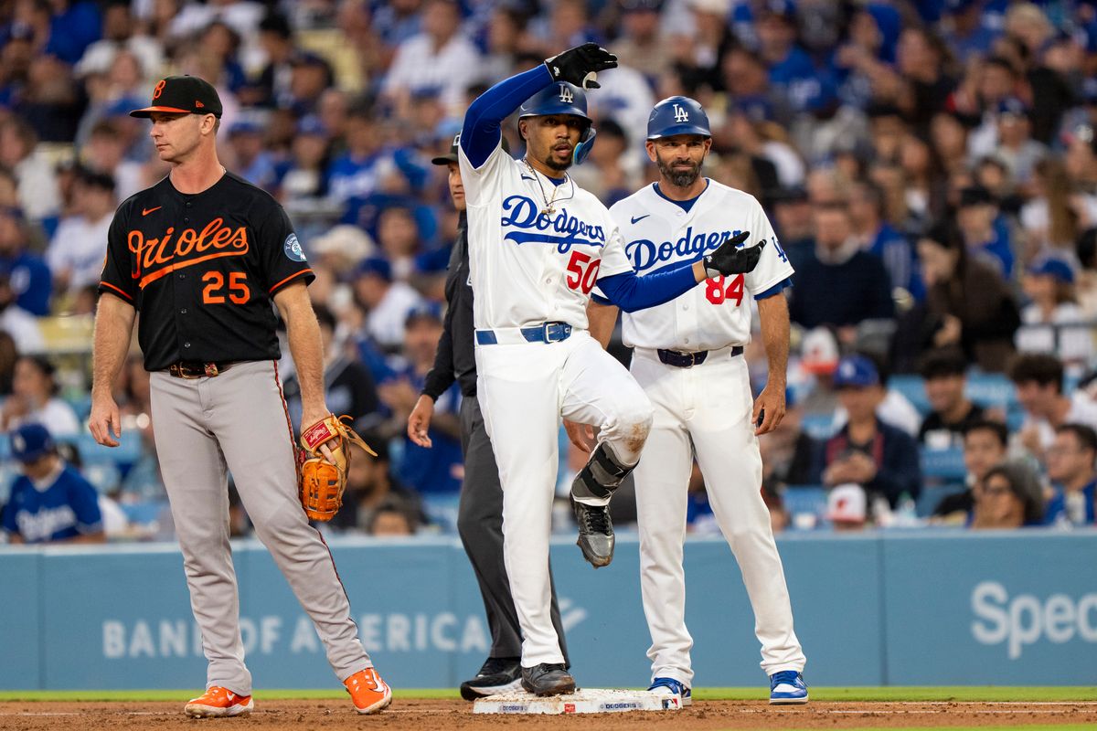 Los Angeles Dodgers infielder Mookie Betts (50) celebrates a hit during an MLB baseball game against the Baltimore Orioles on June 19th, 2026 in Los Angeles, CA. Los Angeles Dodgers infielder Mookie Betts (50) celebrates a hit during an MLB baseball game against the Baltimore Orioles on June 19th, 2026 in Los Angeles, CA.