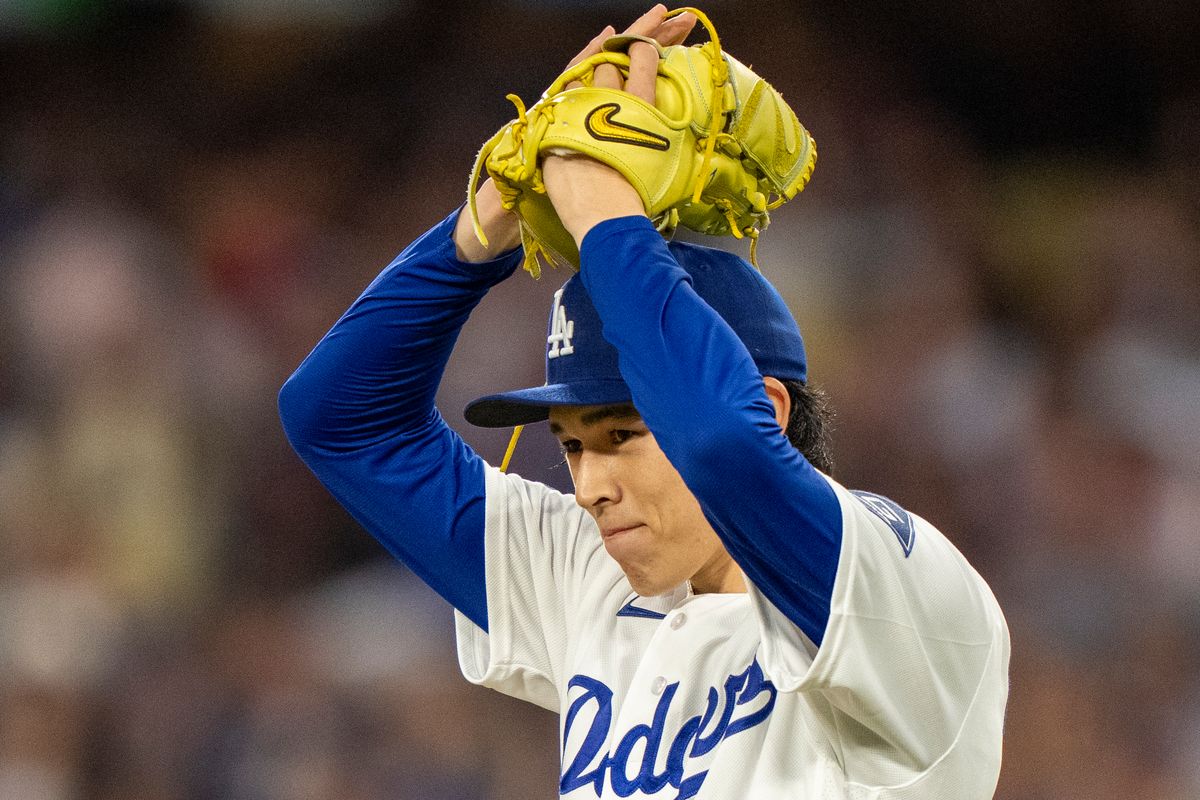 Los Angeles Dodgers pitcher Roki Sasaki (11) smiles after a batter is tagged out at second during an MLB baseball game against the Baltimore Orioles on June 19th, 2026 in Los Angeles, CA. Los Angeles Dodgers pitcher Roki Sasaki (11) smiles after a batter is tagged out at second during an MLB baseball game against the Baltimore Orioles on June 19th, 2026 in Los Angeles, CA.
