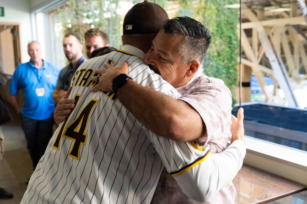 Craig Stammen hugs Padres pitching coach Ruben Niebla after being introduced as the new Padres manager, Monday November 10, 2025 in San Diego, Calif. Craig Stammen hugs Padres pitching coach Ruben Niebla after being introduced as the new Padres manager, Monday November 10, 2025 in San Diego, Calif.
