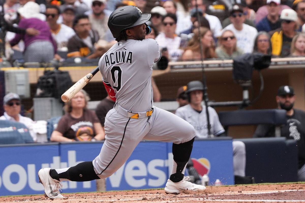 White Sox center fielder Luisangel Acuna (0) hits the ball during an MLB baseball game against the Padres, Sunday May 03, 2026 in San Diego, California. White Sox center fielder Luisangel Acuna (0) hits the ball during an MLB baseball game against the Padres, Sunday May 03, 2026 in San Diego, California.
