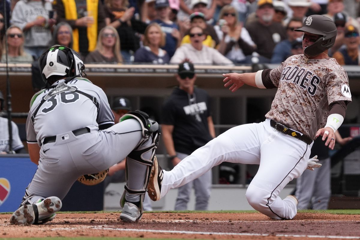 Padres first baseman Ty France (25) slides to home plate during an MLB baseball game against the White Sox, Sunday May 03, 2026 in San Diego, California. Padres first baseman Ty France (25) slides to home plate during an MLB baseball game against the White Sox, Sunday May 03, 2026 in San Diego, California.