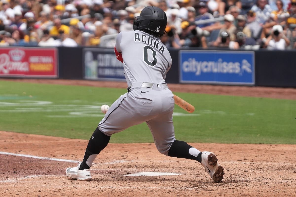 White Sox center fielder Luisangel Acuna (0) swings and misses the ball during an MLB baseball game against the Padres, Sunday May 03, 2026 in San Diego, California. White Sox center fielder Luisangel Acuna (0) swings and misses the ball during an MLB baseball game against the Padres, Sunday May 03, 2026 in San Diego, California.