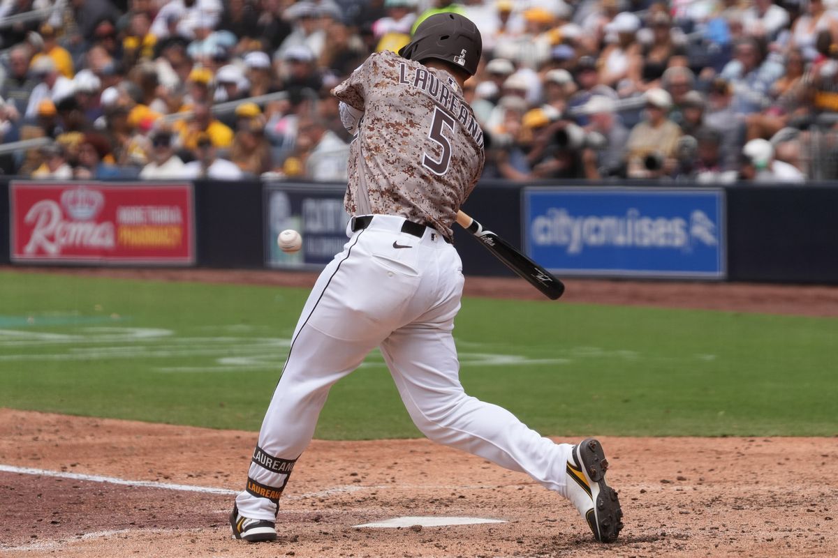 Padres left fielder Ramon Laureano (5) hits a foul ball during an MLB baseball game against the White Sox, Sunday May 03, 2026 in San Diego, California. Padres left fielder Ramon Laureano (5) hits a foul ball during an MLB baseball game against the White Sox, Sunday May 03, 2026 in San Diego, California.