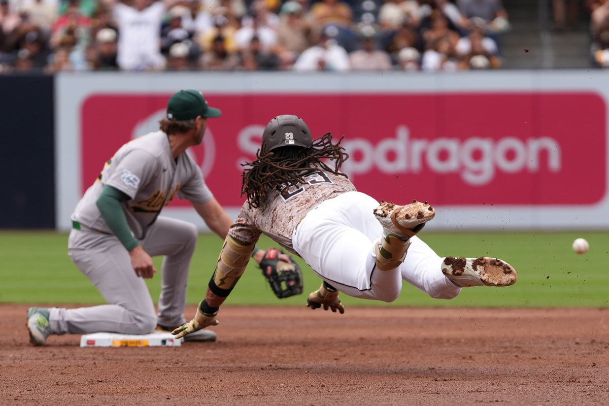 Padres right fielder Fernando Tatis Jr. (23) slides to second base during an MLB baseball game against the Athletics, Sunday May 24, 2026 in San Diego, California. Padres right fielder Fernando Tatis Jr. (23) slides to second base during an MLB baseball game against the Athletics, Sunday May 24, 2026 in San Diego, California.
