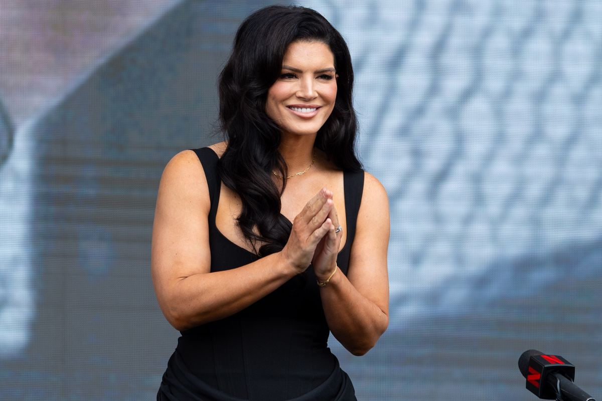 MMA fighter and actress Gina Carano gestures to the crowd after being introduced during a pre-fight press conference for a Netflix fight, Tuesday March 10, 2026 in Inglewood, Calif. MMA fighter and actress Gina Carano gestures to the crowd after being introduced during a pre-fight press conference for a Netflix fight, Tuesday March 10, 2026 in Inglewood, Calif.