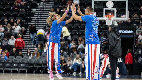 Harlem Globetrotters guard Sunshine West (8) celebrates during a Harlem Globetrotter basketball game against The Washington Generals, Friday February 20, 2026 in Los Angeles. Harlem Globetrotters guard Sunshine West (8) celebrates during a Harlem Globetrotter basketball game against The Washington Generals, Friday February 20, 2026 in Los Angeles.
