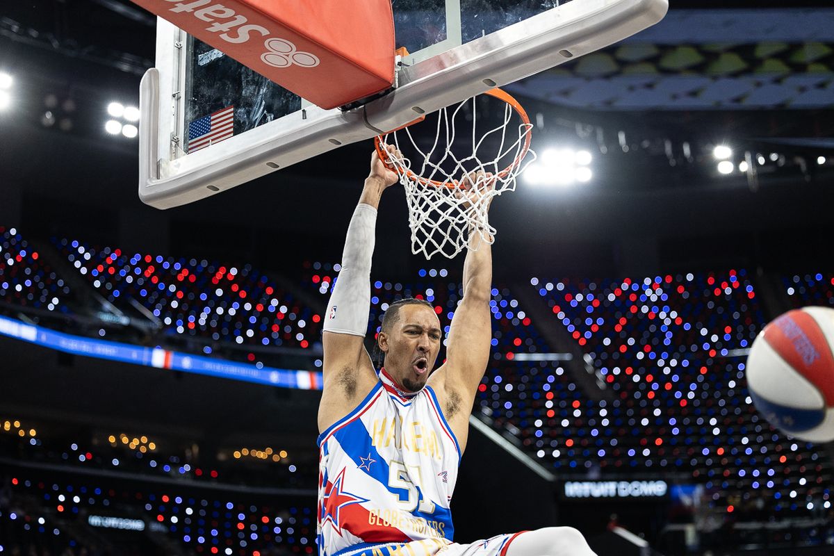 Harlem Globetrotters finisher Big Dog Whitsett (51) dunks the ball during a Harlem Globetrotters basketball game against The Washington Generals, Friday February 20, 2026 in Los Angeles.