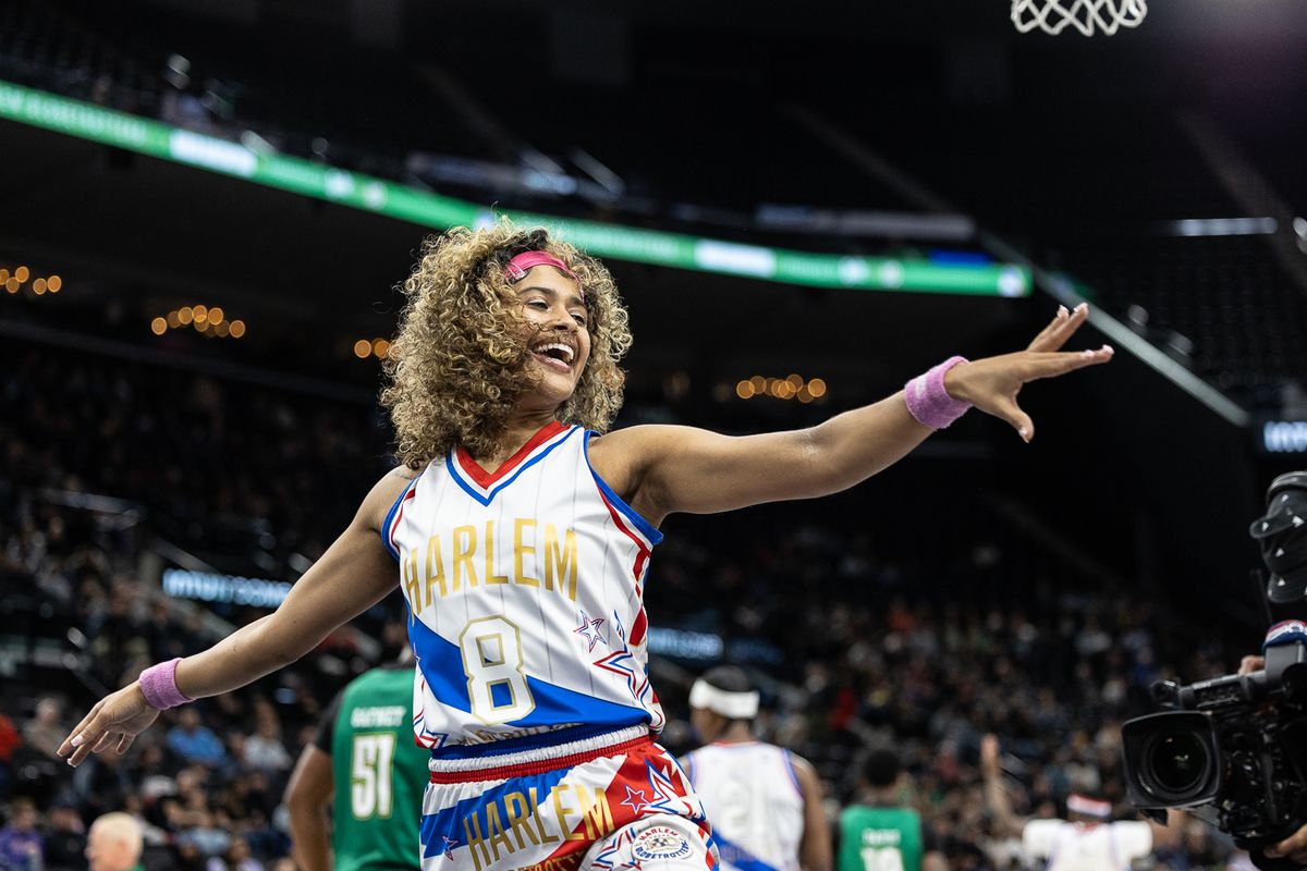 Harlem Globetrotters guard Sunshine West (8) gestures during a Harlem Globetrotter basketball game against The Washington Generals, Friday February 20, 2026 in Los Angeles.
