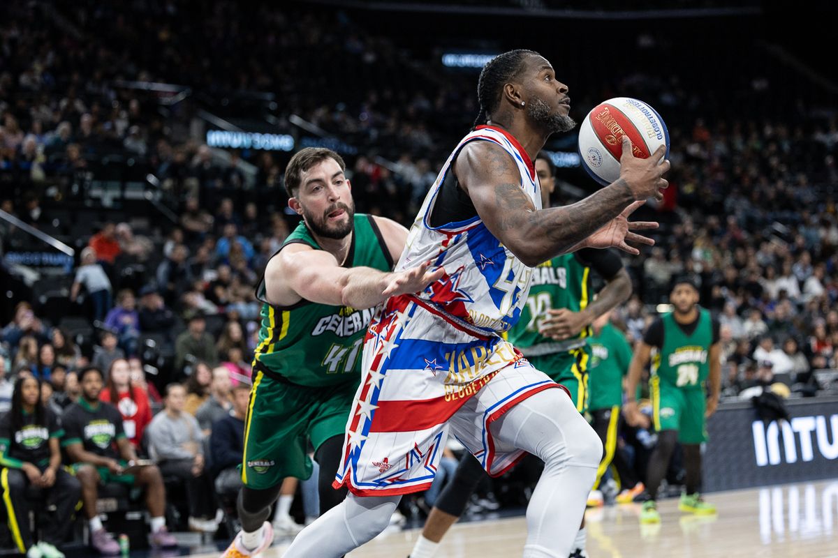 Harlem Globetrotters forward Spider Sharpless (42) dribbles during a Harlem Globetrotters basketball game against The Washington Generals, Friday February 20, 2026 in Los Angeles.