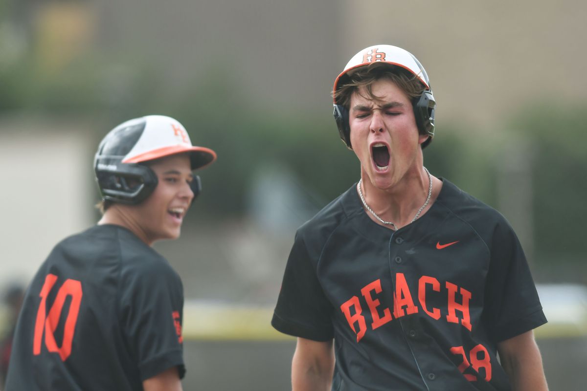 Huntington Beach Jared Grindlinger (28) reacts to scoring a run during an High School Baseball game against Temecula Valley Tuesday May 12, 2026 in Temecula, California. Huntington Beach Jared Grindlinger (28) reacts to scoring a run during an High School Baseball game against Temecula Valley Tuesday May 12, 2026 in Temecula, California.