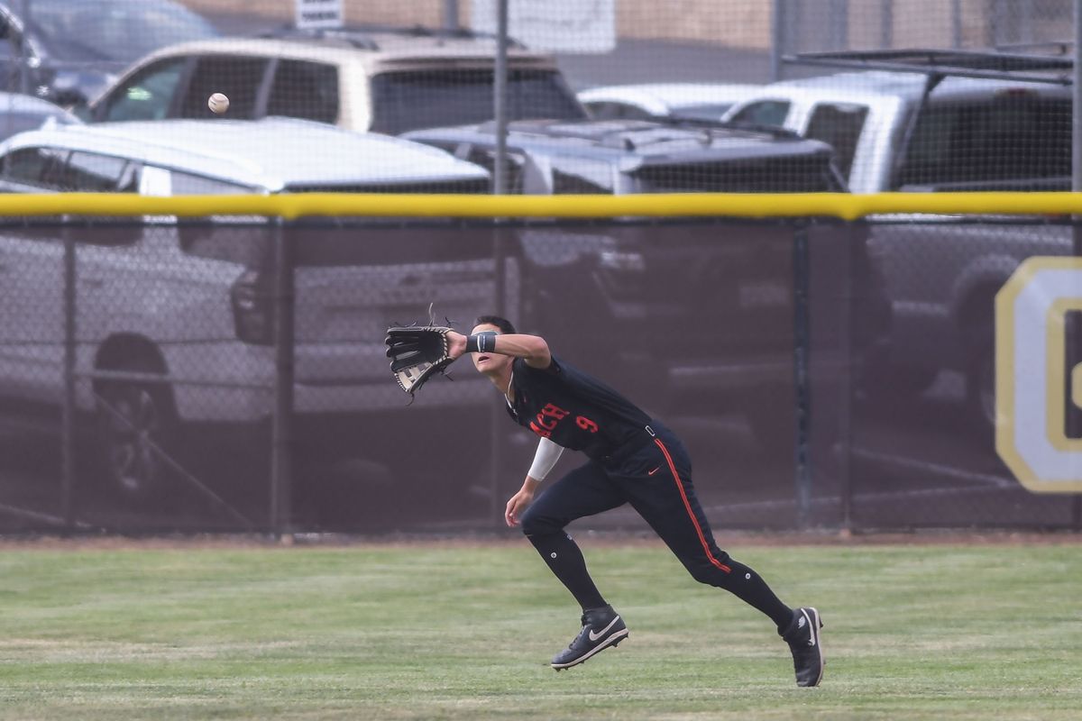 Huntington Beach Elyjah Mason (9) feels a fly ball during an High School Baseball game against Temecula Valley Tuesday May 12, 2026 in Temecula, California. Huntington Beach Elyjah Mason (9) feels a fly ball during an High School Baseball game against Temecula Valley Tuesday May 12, 2026 in Temecula, California.