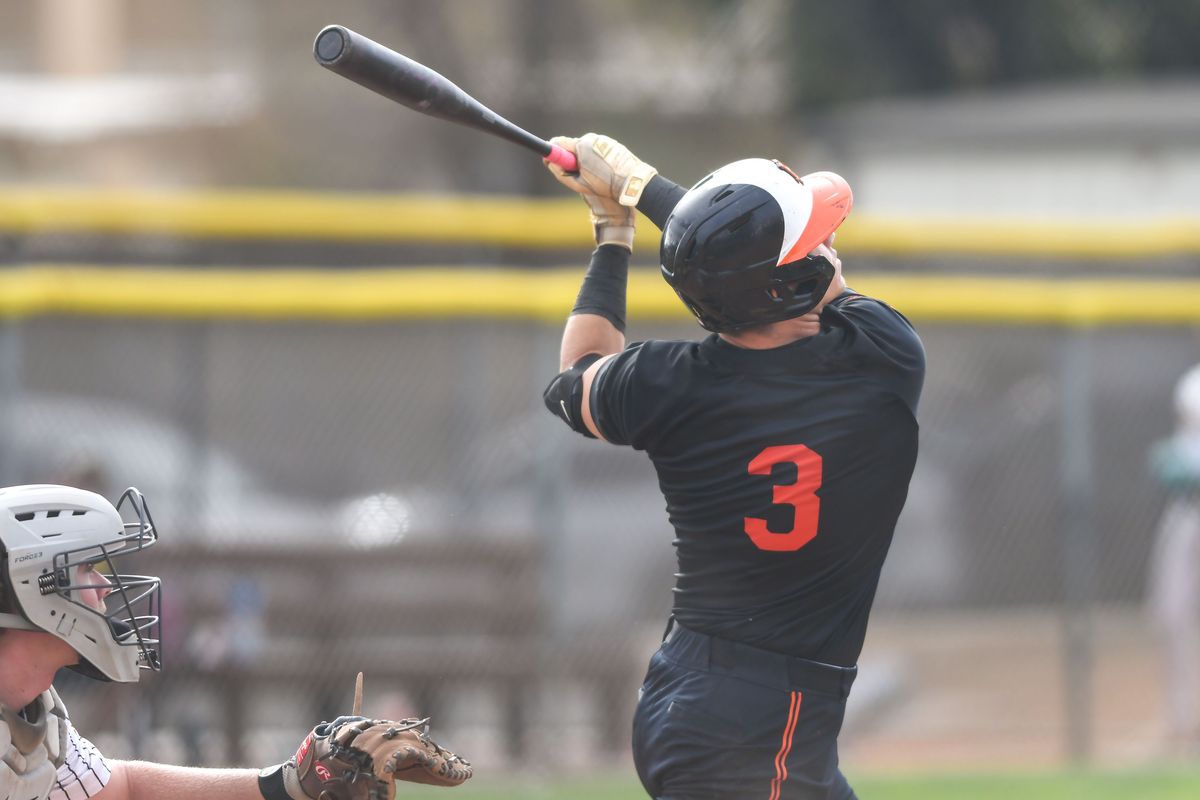 Huntington Beach Owen Bone (3) follows through on a swing during an High School Baseball game against Temecula Valley Tuesday May 12, 2026 in Temecula, California. Huntington Beach Owen Bone (3) follows through on a swing during an High School Baseball game against Temecula Valley Tuesday May 12, 2026 in Temecula, California.