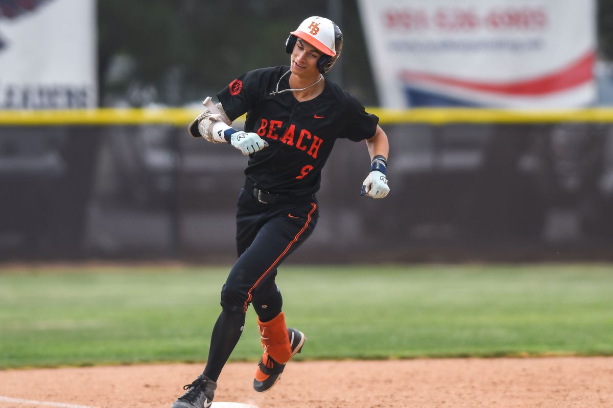 Huntington Beach Elyjah Mason (9) rounds the bases following hitting a homer during an High School Baseball game against Temecula Valley Tuesday May 12, 2026 in Temecula, California. Huntington Beach Elyjah Mason (9) rounds the bases following hitting a homer during an High School Baseball game against Temecula Valley Tuesday May 12, 2026 in Temecula, California.