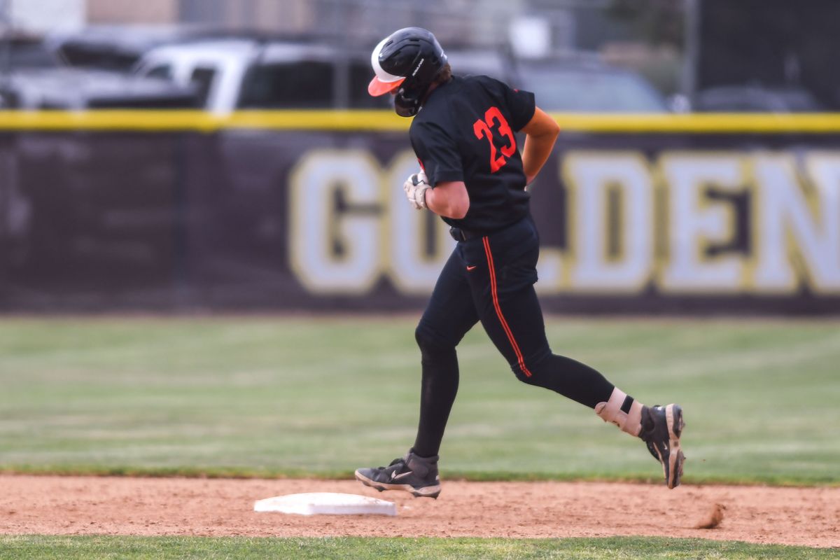 Huntington Beach Dane Cunningham (23) trots around the bases following hitting a homer during an High School Baseball game against Temecula Valley Tuesday May 12, 2026 in Temecula, California. Huntington Beach Dane Cunningham (23) trots around the bases following hitting a homer during an High School Baseball game against Temecula Valley Tuesday May 12, 2026 in Temecula, California.