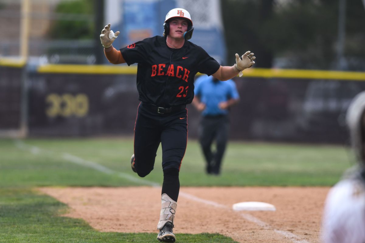 Huntington Beach Dane Cunningham (23) trots around the bases following hitting a homer during an High School Baseball game against Temecula Valley Tuesday May 12, 2026 in Temecula, California. Huntington Beach Dane Cunningham (23) trots around the bases following hitting a homer during an High School Baseball game against Temecula Valley Tuesday May 12, 2026 in Temecula, California.