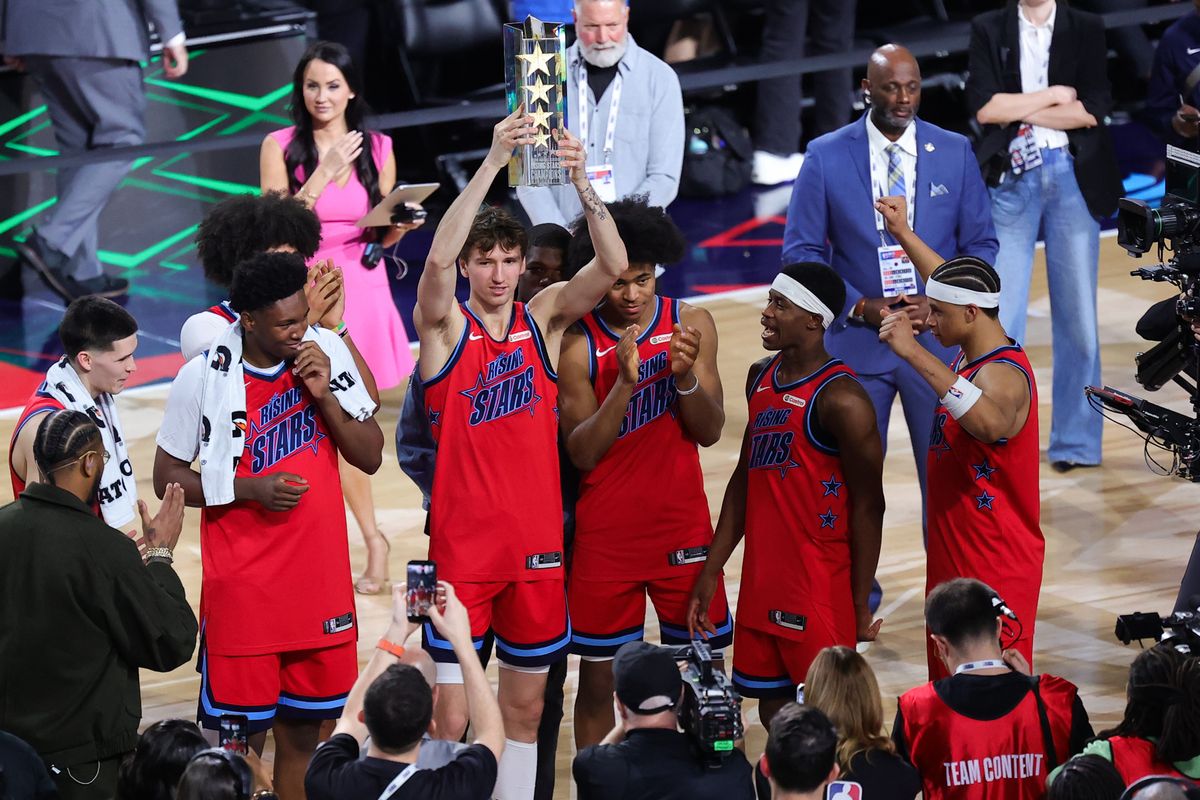 Team Vince celebrates winning the championship trophy after the NBA Rising Stars game on February 13, 2026 in Inglewood, CA.