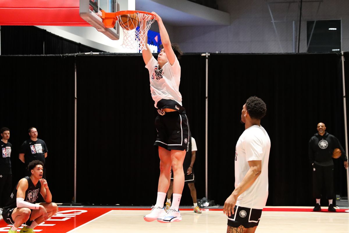Portland Trailblazers guard Yang Hansen (16) dunks the basketball during NBA Rising Stars practice on February 13, 2026 in Inglewood, CA. Portland Trailblazers guard Yang Hansen (16) dunks the basketball during NBA Rising Stars practice on February 13, 2026 in Inglewood, CA.