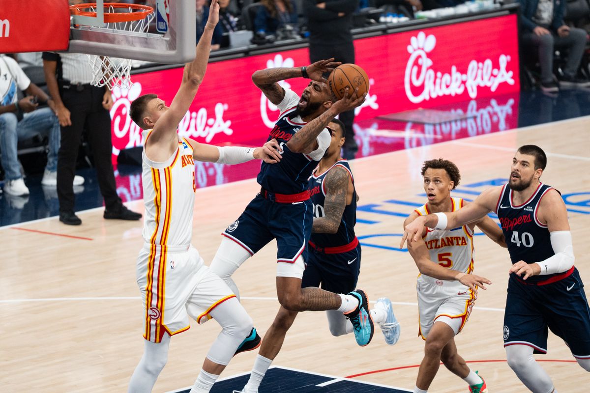 Los Angeles Clippers forward Derrick Jones Jr. (5) attacks the rim and scores at an NBA basketball game against the Atlanta Hawks, Monday November 10th, 2025 in Inglewood, California. Los Angeles Clippers forward Derrick Jones Jr. (5) attacks the rim and scores at an NBA basketball game against the Atlanta Hawks, Monday November 10th, 2025 in Inglewood, California.