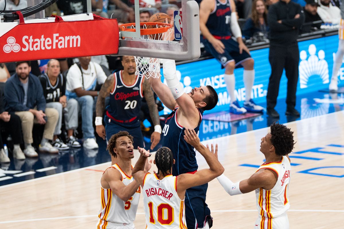 Los Angeles Clippers Center Ivica Zubac (40) goes up on three defenders in the paint at an NBA basketball game against the Atlanta Hawks, Monday November 10th, 2025 in Inglewood, California. Los Angeles Clippers Center Ivica Zubac (40) goes up on three defenders in the paint at an NBA basketball game against the Atlanta Hawks, Monday November 10th, 2025 in Inglewood, California.