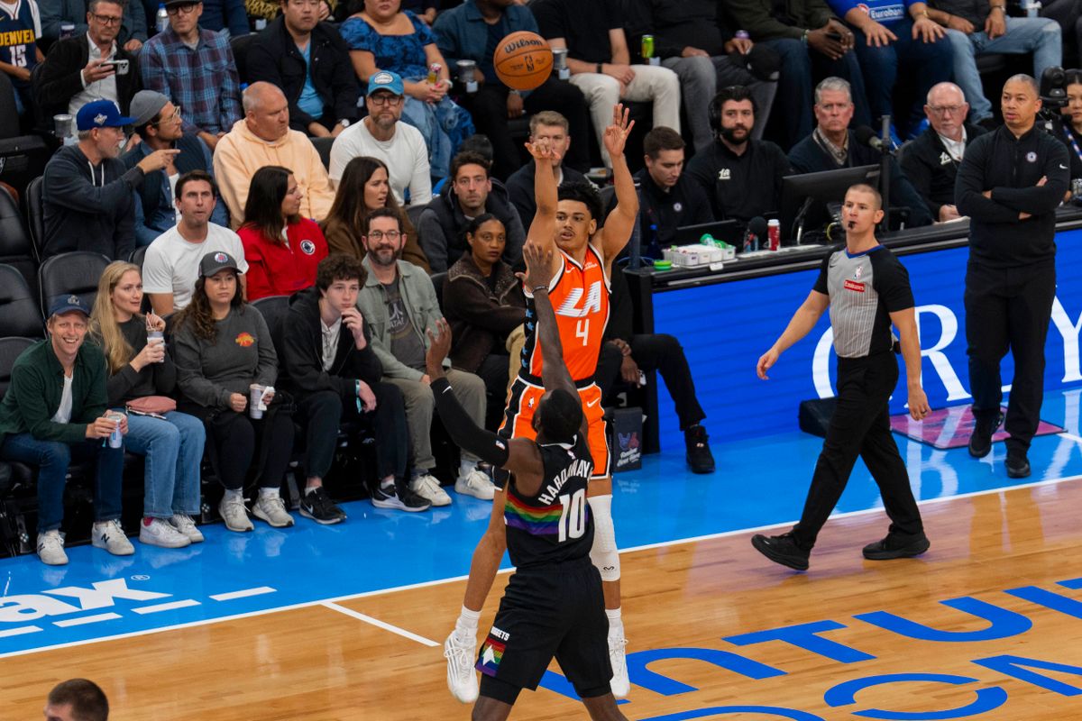 Los Angeles Clippers guard Kobe Sanders (4) takes a three during an NBA basketball game against the Denver Nuggets, Tuesday November 12th, 2025 in Los Angeles, California. Los Angeles Clippers guard Kobe Sanders (4) takes a three during an NBA basketball game against the Denver Nuggets, Tuesday November 12th, 2025 in Los Angeles, California.