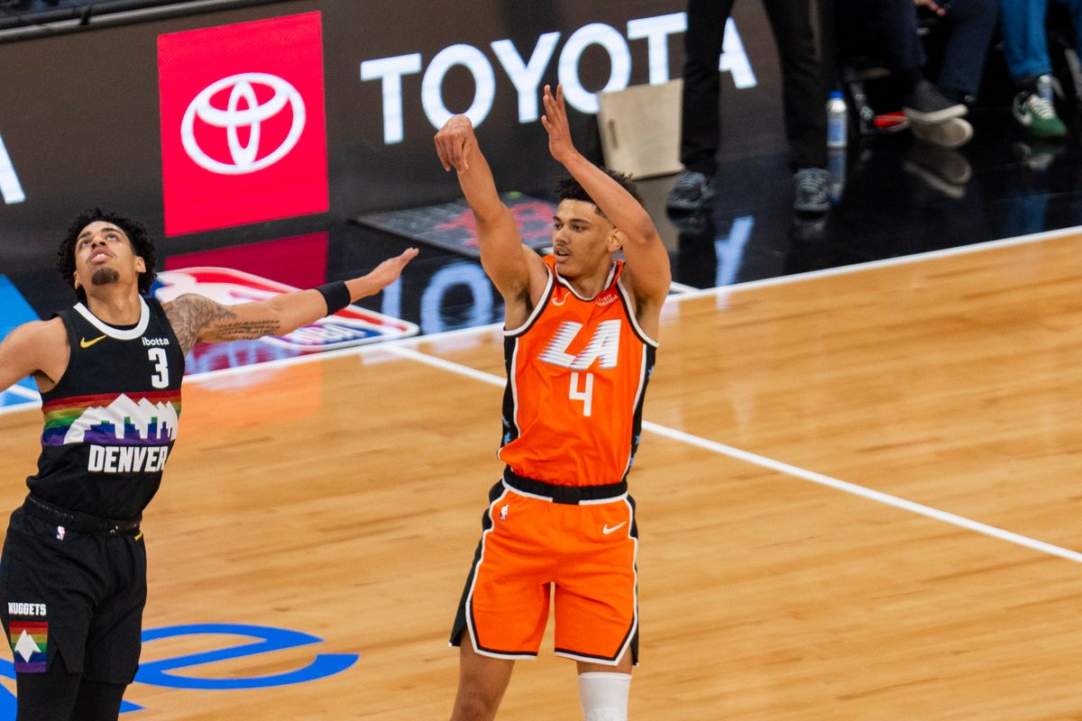 Los Angeles Clippers guard Kobe Sanders (4) takes a three during an NBA basketball game against the Denver Nuggets, Tuesday November 12th, 2025 in Los Angeles, California. Los Angeles Clippers guard Kobe Sanders (4) takes a three during an NBA basketball game against the Denver Nuggets, Tuesday November 12th, 2025 in Los Angeles, California.