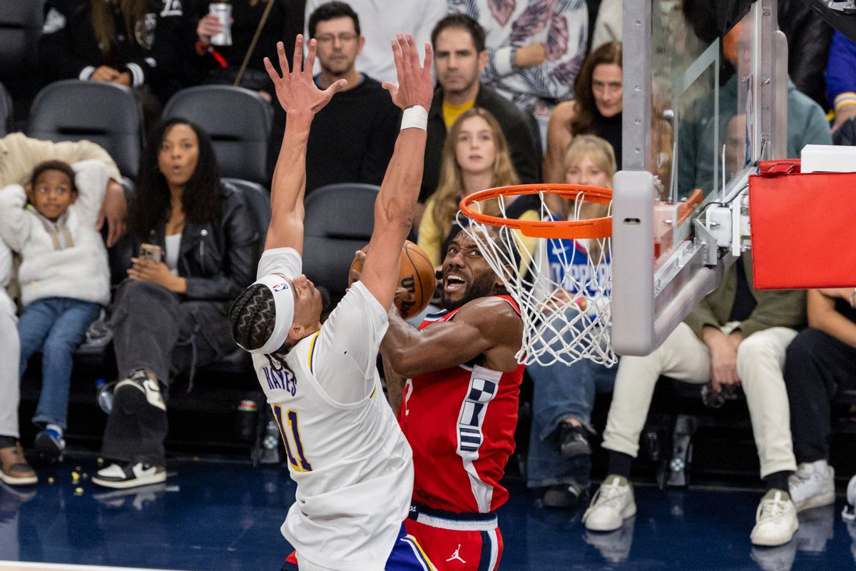 Kawhi Leonard #2 of the LA Clippers drives towards the rim against Jaxson Hayes #11 of the Los Angeles Lakers during an NBA basketball game, Saturday December 20, 2025 in Inglewood, Calif. Kawhi Leonard #2 of the LA Clippers drives towards the rim against Jaxson Hayes #11 of the Los Angeles Lakers during an NBA basketball game, Saturday December 20, 2025 in Inglewood, Calif.
