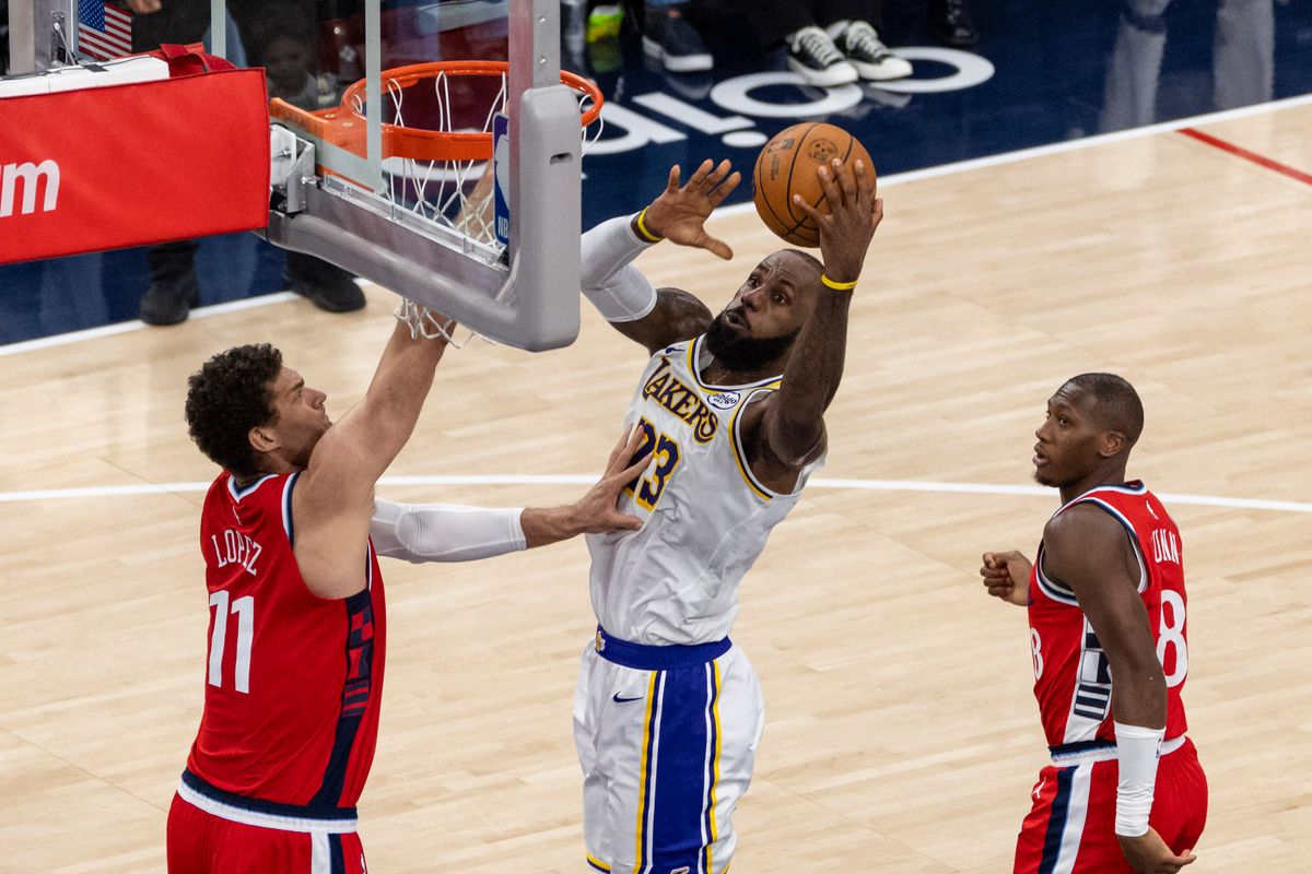 LeBron James #23 of the Los Angeles Lakers drives towards the rim during an NBA basketball game against the LA Clippers, Saturday December 20, 2025 in Inglewood, Calif. LeBron James #23 of the Los Angeles Lakers drives towards the rim during an NBA basketball game against the LA Clippers, Saturday December 20, 2025 in Inglewood, Calif.
