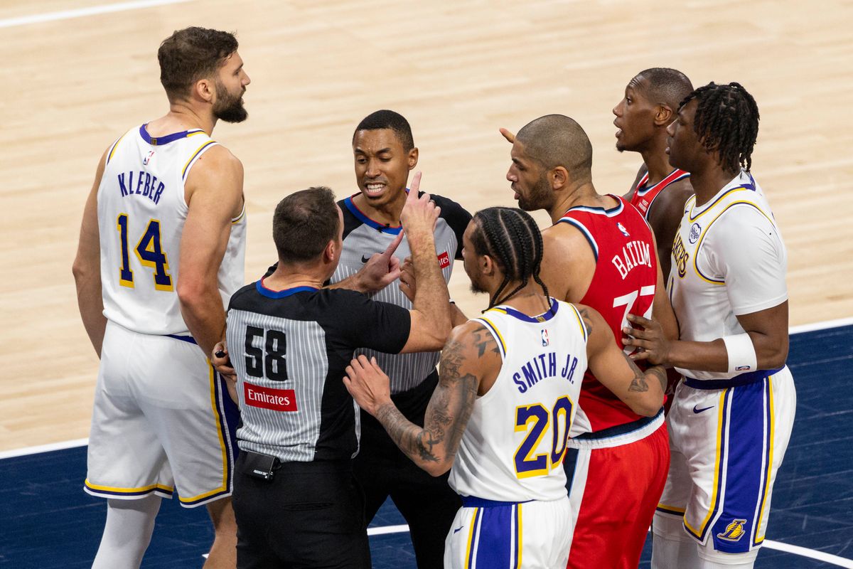 Maxi Kleber #14 of the Los Angeles Lakers and Kris Dunn #8 of the LA Clippers have words after a play during an NBA basketball game, Saturday December 20, 2025 in Inglewood, Calif. Maxi Kleber #14 of the Los Angeles Lakers and Kris Dunn #8 of the LA Clippers have words after a play during an NBA basketball game, Saturday December 20, 2025 in Inglewood, Calif.