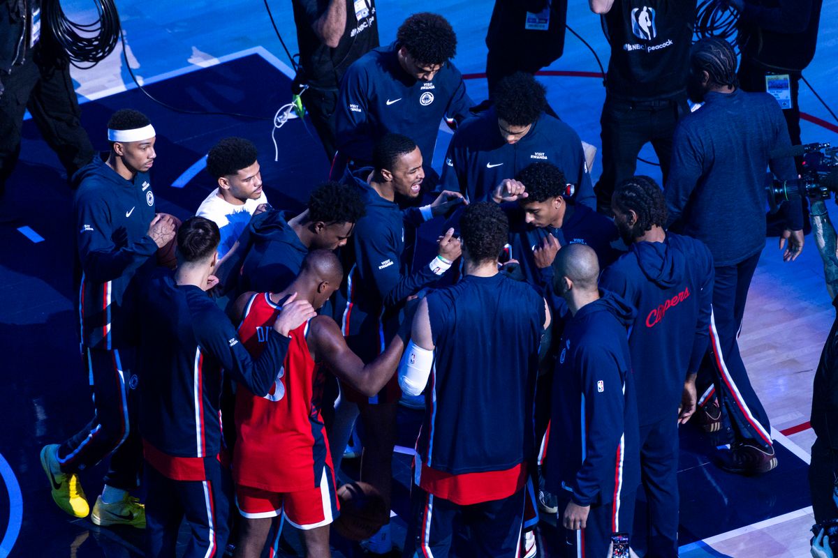 The LA Clippers huddle after the starting lineups are introduced before an NBA basketball game against the Houston Rockets, Tuesday December 23, 2025 in Inglewood, Calif. The LA Clippers huddle after the starting lineups are introduced before an NBA basketball game against the Houston Rockets, Tuesday December 23, 2025 in Inglewood, Calif.