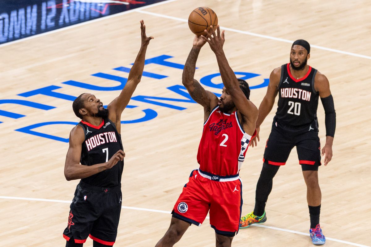 Kawhi Leonard #2 of the LA Clippers shoots over Kevin Durant #7 of the Houston Rockets during an NBA basketball game, Tuesday December 23, 2025 in Inglewood, Calif. Kawhi Leonard #2 of the LA Clippers shoots over Kevin Durant #7 of the Houston Rockets during an NBA basketball game, Tuesday December 23, 2025 in Inglewood, Calif.