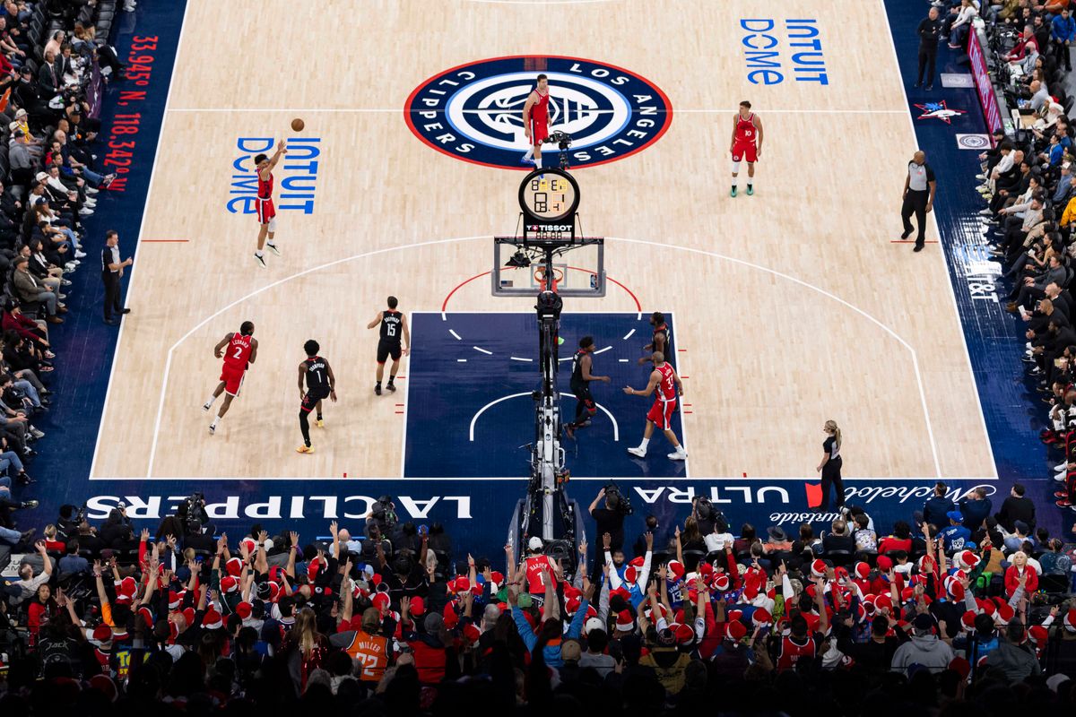 Kobe Sanders #4 of the LA Clippers shoots a three pointer in front of The Wall fan section at Intuit Dome during an NBA basketball game against the Houston Rockets, Tuesday December 23, 2025 in Inglewood, Calif. Kobe Sanders #4 of the LA Clippers shoots a three pointer in front of The Wall fan section at Intuit Dome during an NBA basketball game against the Houston Rockets, Tuesday December 23, 2025 in Inglewood, Calif.