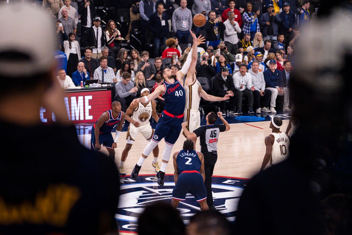 Ivica Zubac #40 of the LA Clippers and Quinten Post #21 of the Golden State Warriors jump for the opening tip during an NBA basketball game, Monday January 5, 2026 in Inglewood, Calif. Ivica Zubac #40 of the LA Clippers and Quinten Post #21 of the Golden State Warriors jump for the opening tip during an NBA basketball game, Monday January 5, 2026 in Inglewood, Calif.