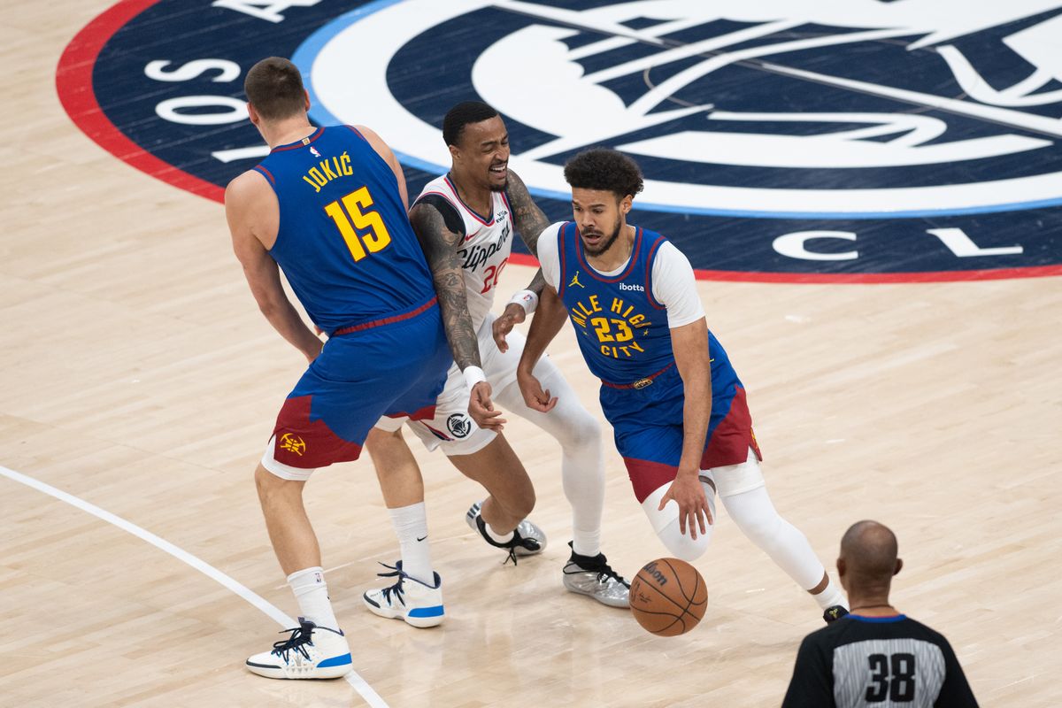 Denver Nuggets forward Cam Johnson (23) dribbles through a screen during a game between the Los Angeles Clippers and the Denver Nuggets on Thursday, February 19,2026 at Intuit Dome in Inglewood Calif