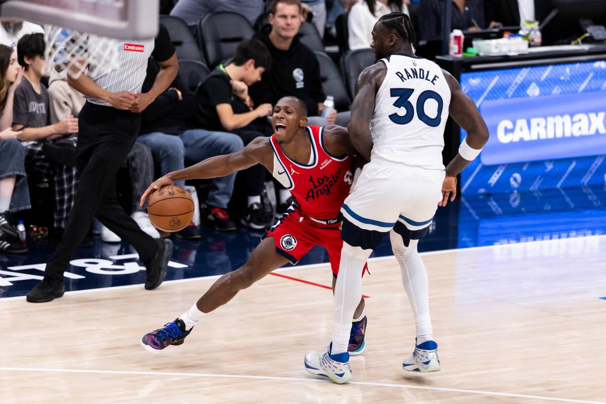 Kris Dunn #8 of the LA Clippers tries to get around Julius Randle #30 of the Minnesota Timberwolves during an NBA basketball game, Thursday February 26, 2026 in Inglewood, Calif. Kris Dunn #8 of the LA Clippers tries to get around Julius Randle #30 of the Minnesota Timberwolves during an NBA basketball game, Thursday February 26, 2026 in Inglewood, Calif.