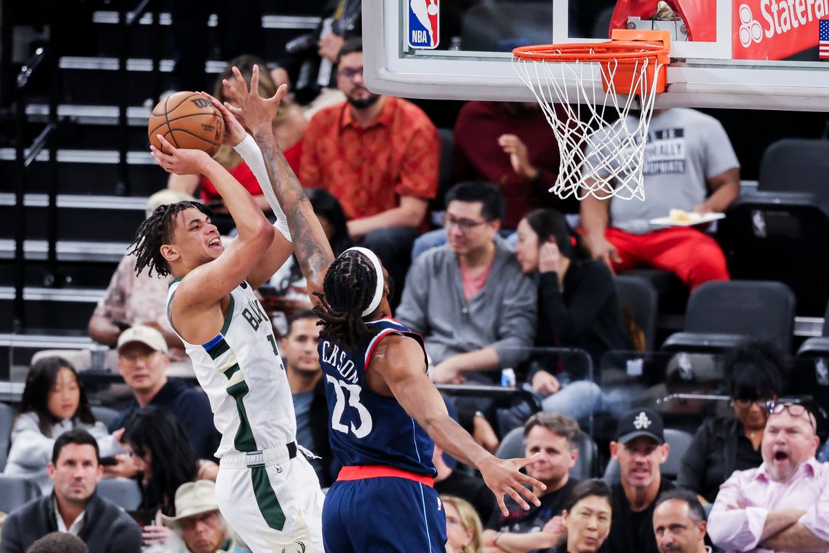 Ousmane Dieng #21 of the Milwaukee Bucks shoots the ball over Isaiah Jackson #23 of the LA Clippers during an NBA basketball game, 2026 in Inglewood, Calif. Ousmane Dieng #21 of the Milwaukee Bucks shoots the ball over Isaiah Jackson #23 of the LA Clippers during an NBA basketball game, 2026 in Inglewood, Calif.
