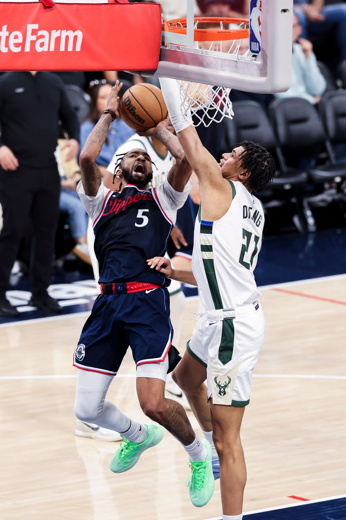 Derrick Jones Jr. #5 of the LA Clippers shoots the ball over Ousmane Dieng #21 of the Milwaukee Bucks during an NBA basketball game, 2026 in Inglewood, Calif. Derrick Jones Jr. #5 of the LA Clippers shoots the ball over Ousmane Dieng #21 of the Milwaukee Bucks during an NBA basketball game, 2026 in Inglewood, Calif.
