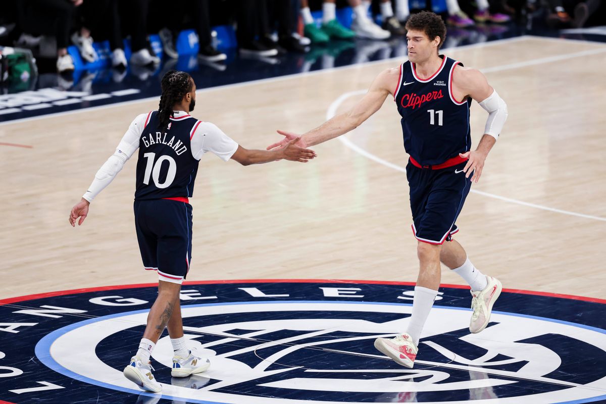 Darius Garland #10 and Brook Lopez #11 of the LA Clippers high five after a play during an NBA basketball game against the Milwaukee Bucks, Monday March 23, 2026 in Inglewood, Calif. Darius Garland #10 and Brook Lopez #11 of the LA Clippers high five after a play during an NBA basketball game against the Milwaukee Bucks, Monday March 23, 2026 in Inglewood, Calif.
