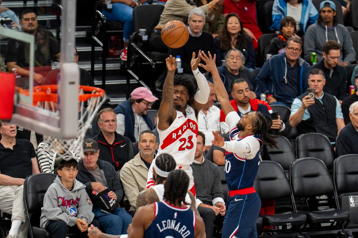 Toronto Raptors guard Jamal Shead (23) shoots a three pointer during an NBA basketball game against the Los Angeles Clippers Wednesday March 25th, 2026 in Los Angeles, California. Toronto Raptors guard Jamal Shead (23) shoots a three pointer during an NBA basketball game against the Los Angeles Clippers Wednesday March 25th, 2026 in Los Angeles, California.