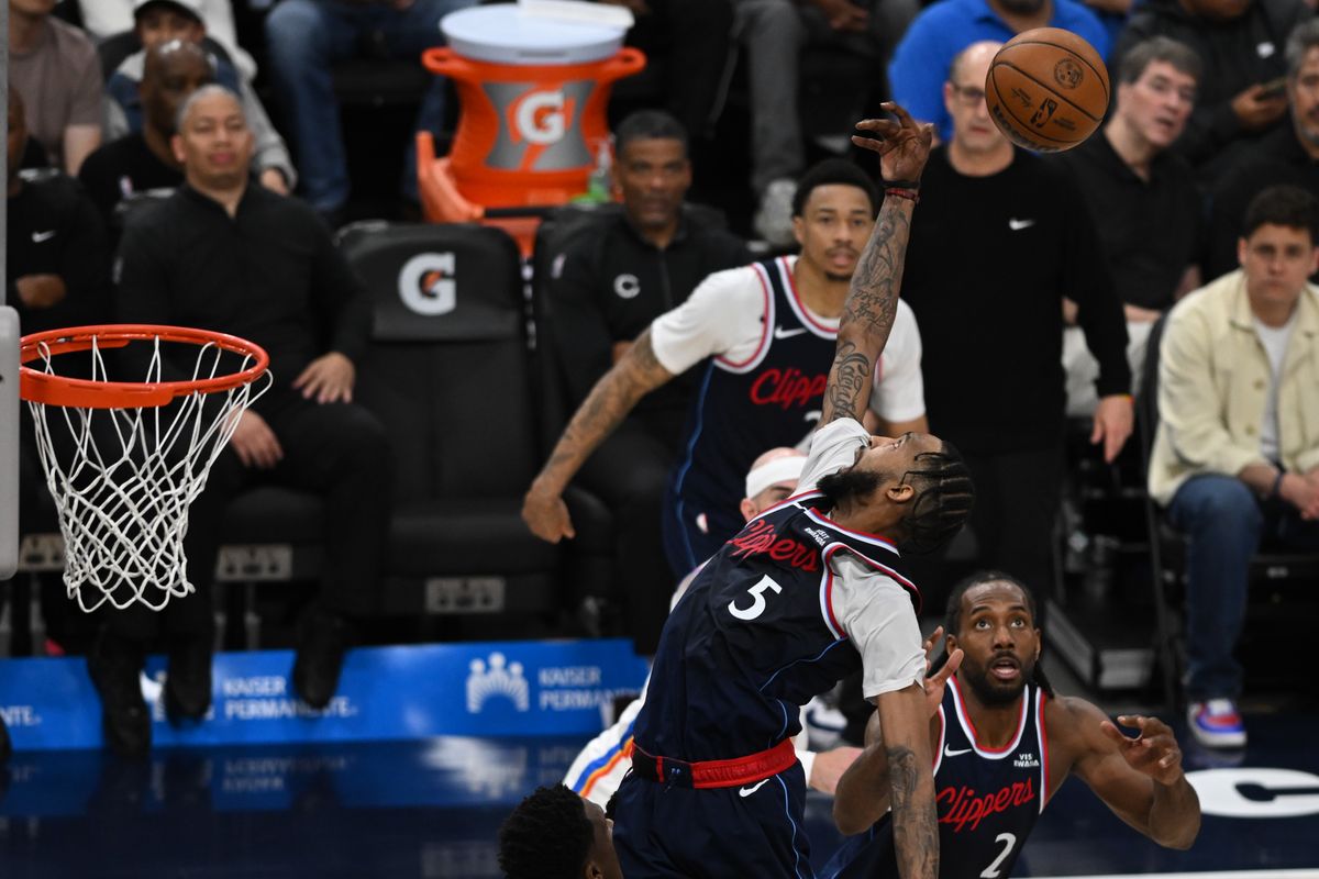 Los Angeles Clippers forward Derrick Jones Jr (5) jumps high for a rebound during a game between the Los Angeles Clippers and OKC Thunder on Wednesday, April 8, 2026 at Intuit Dome in Inglewood Calif Los Angeles Clippers forward Derrick Jones Jr (5) jumps high for a rebound during a game between the Los Angeles Clippers and OKC Thunder on Wednesday, April 8, 2026 at Intuit Dome in Inglewood Calif
