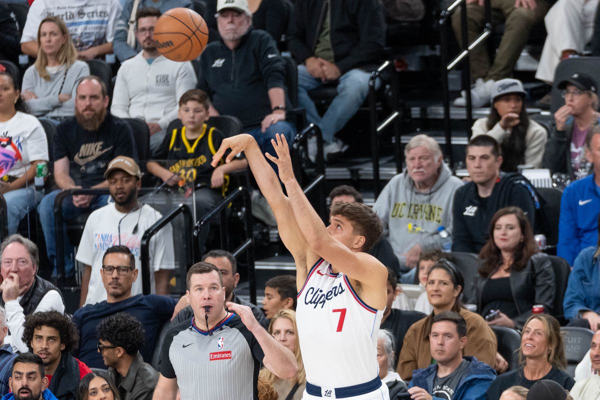 Los Angeles Clippers guard Bogdan Bogdanovic (7) shoots a three-pointer during an NBA basketball game against the Golden State Warriors,Sunday April 12th, 2026 in Inglewood, California. Los Angeles Clippers guard Bogdan Bogdanovic (7) shoots a three-pointer during an NBA basketball game against the Golden State Warriors,Sunday April 12th, 2026 in Inglewood, California.