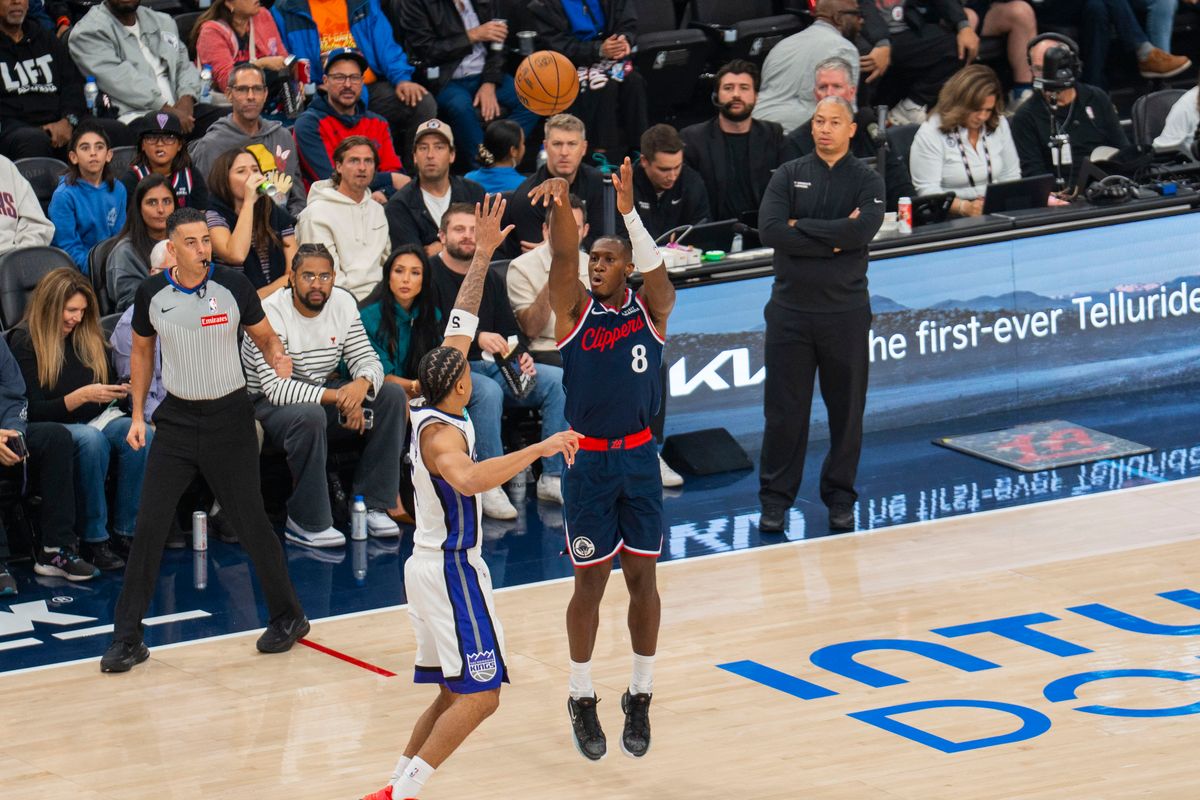 Los Angeles Clippers guard Kris Dunn (8) makes a three pointer during an NBA basketball game against the Sacramento Kings, Wednesday October 21st, 2026 in Los Angeles, California. Los Angeles Clippers guard Kris Dunn (8) makes a three pointer during an NBA basketball game against the Sacramento Kings, Wednesday October 21st, 2026 in Los Angeles, California.