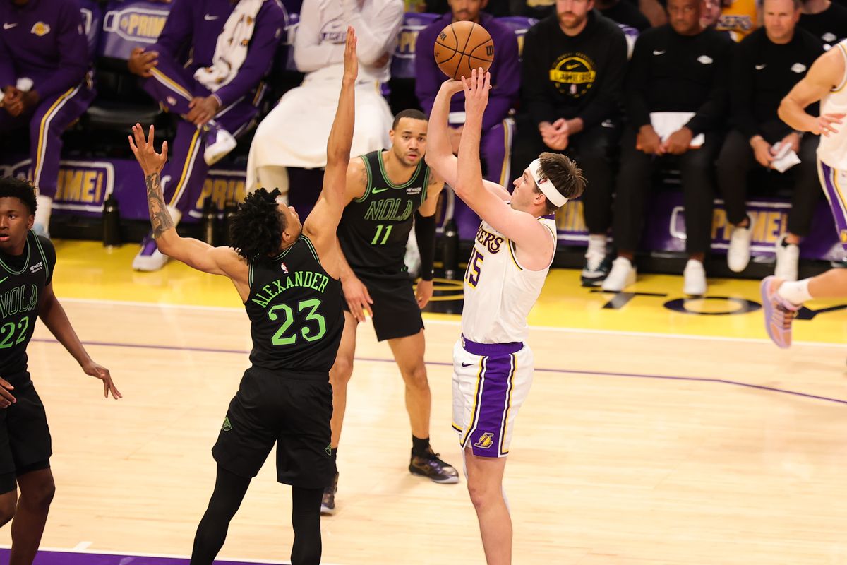 #15 G Austin Reaves of the Los Angeles Lakers shoots a jumpshot during an NBA game against the New Orleans Pelicans on November 30, 2025 in Los Angeles, CA. #15 G Austin Reaves of the Los Angeles Lakers shoots a jumpshot during an NBA game against the New Orleans Pelicans on November 30, 2025 in Los Angeles, CA.