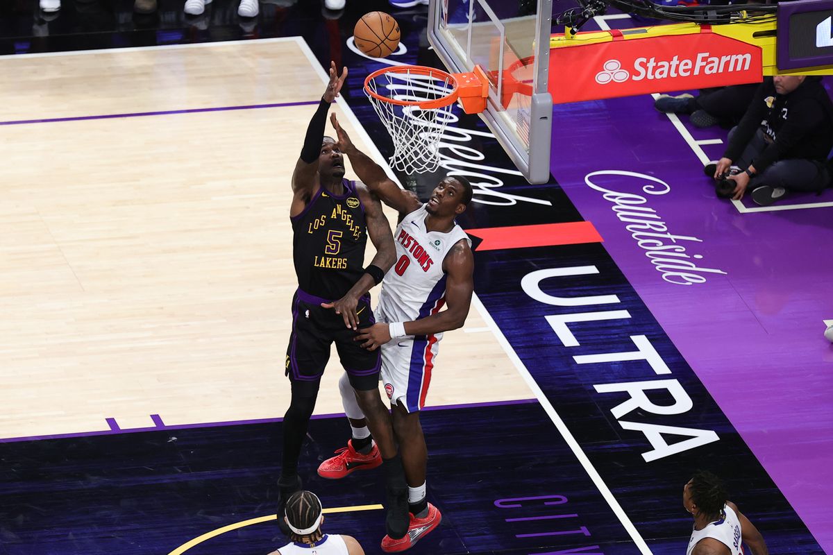 #5 C Deandre Ayton of the Los Angeles Lakers shoots a hook shot during an NBA game against the Detroit Pistons on December 30, 2025 in Los Angeles, CA. #5 C Deandre Ayton of the Los Angeles Lakers shoots a hook shot during an NBA game against the Detroit Pistons on December 30, 2025 in Los Angeles, CA.