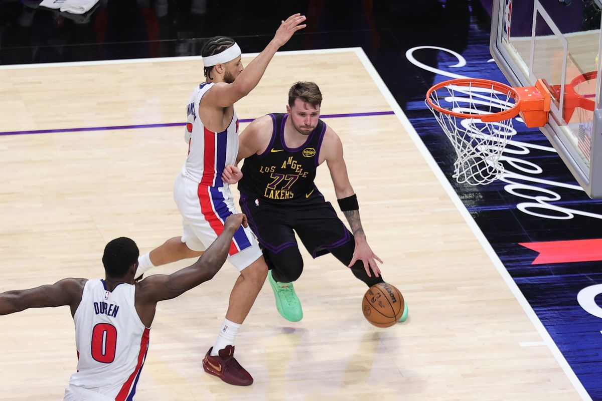 #77 PG Luka Doncic of the Los Angeles Lakers drives the lane during an NBA game against the Detroit Pistons on December 30, 2025 in Los Angeles, CA. #77 PG Luka Doncic of the Los Angeles Lakers drives the lane during an NBA game against the Detroit Pistons on December 30, 2025 in Los Angeles, CA.