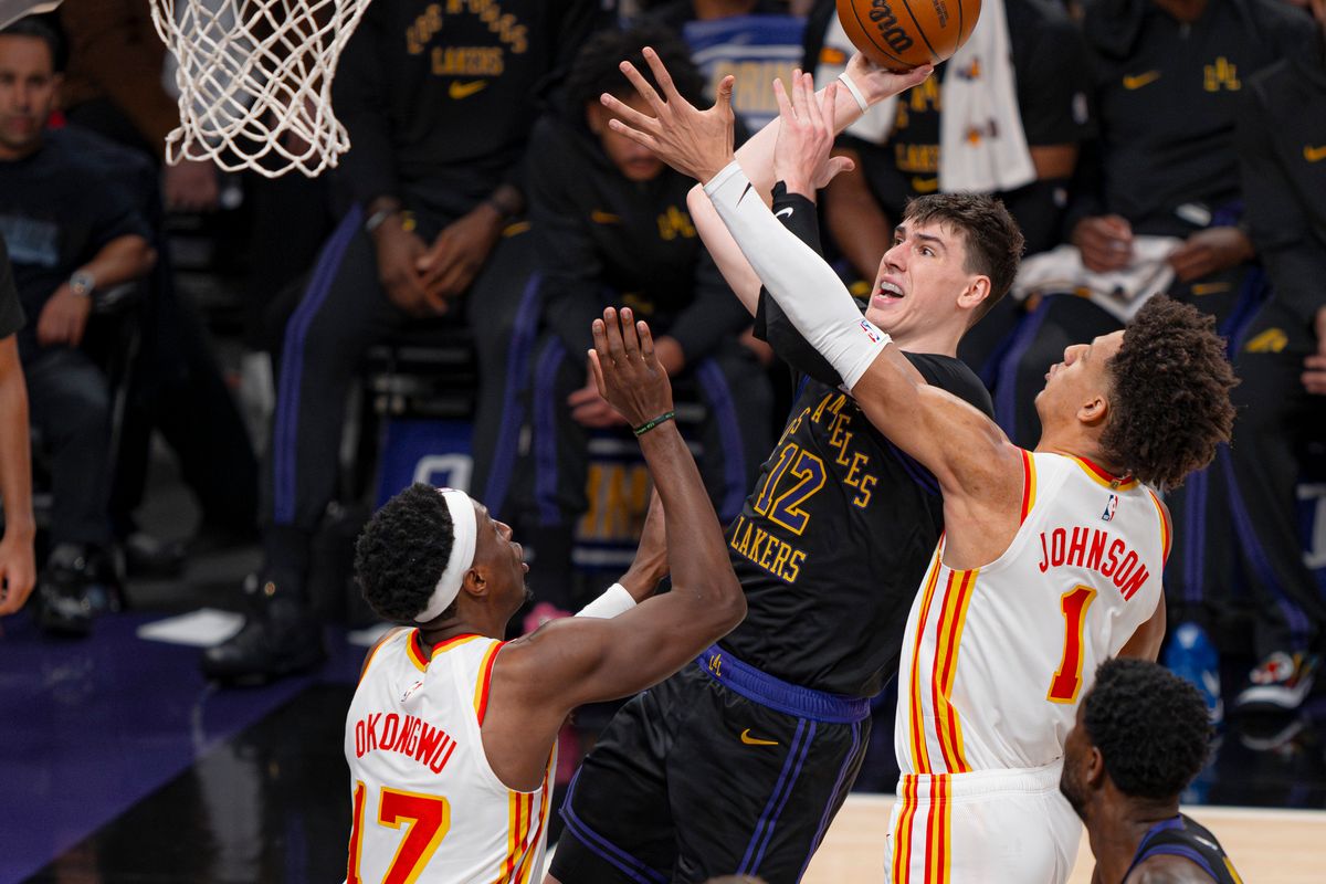 Los Angeles Lakers forward Jake LaRavia (12) shooting for 1 point during an NBA basketball game against the Atlanta Hawks on January 13th, 2026 in Los Angeles, CA.
