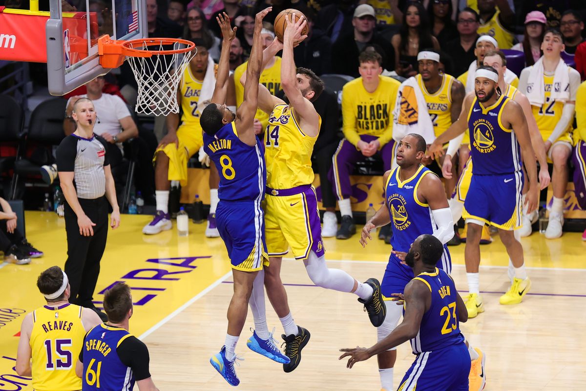 Los Angeles Lakers forward Maxi Kleber (14) shoots the basketball during an NBA game against the Golden State Warriors on February 7, 2025 in Los Angeles, CA. Los Angeles Lakers forward Maxi Kleber (14) shoots the basketball during an NBA game against the Golden State Warriors on February 7, 2025 in Los Angeles, CA.