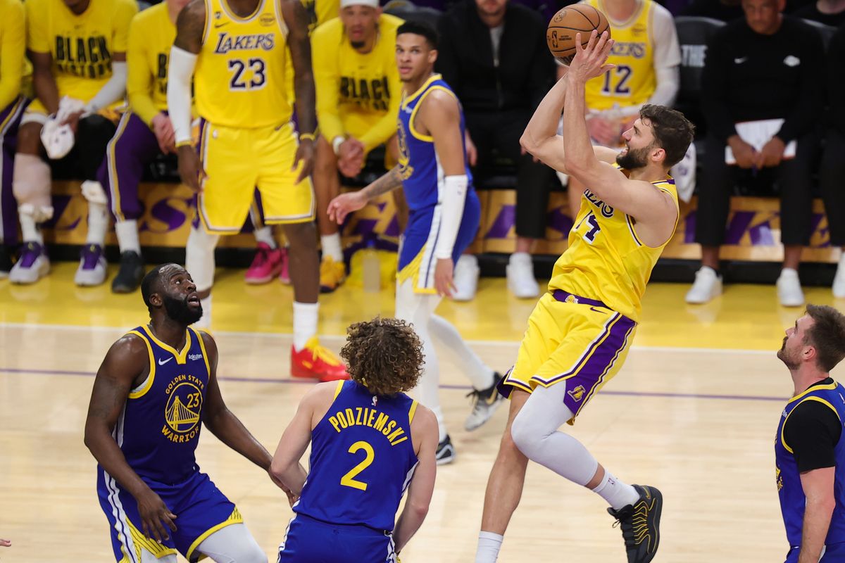 Los Angeles Lakers forward Maxi Kleber (14) shoots the basketball during an NBA game against the Golden State Warriors on February 7, 2025 in Los Angeles, CA. Los Angeles Lakers forward Maxi Kleber (14) shoots the basketball during an NBA game against the Golden State Warriors on February 7, 2025 in Los Angeles, CA.