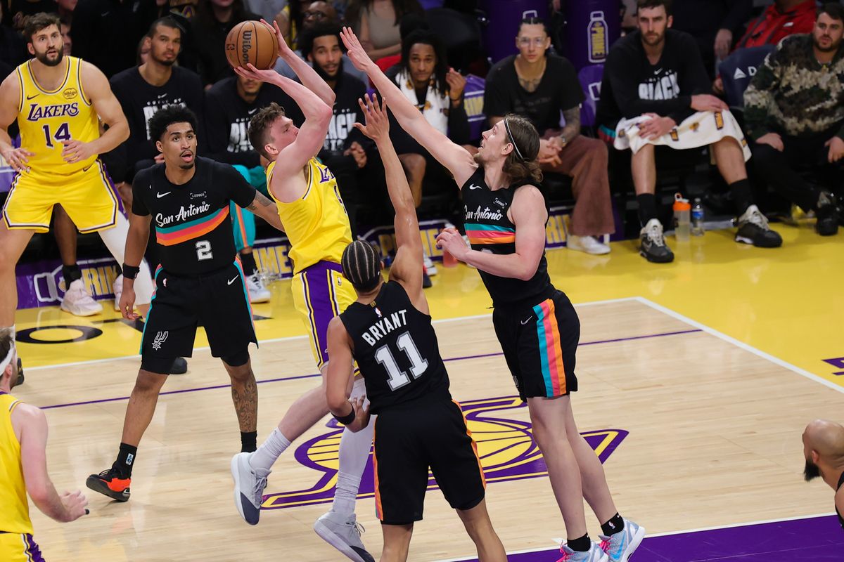 Los Angeles Lakers guard Dalton Knecht (4) shoots the basketball during an NBA game against the San Antonio Spurs on February 10, 2026 in Los Angeles, CA. Los Angeles Lakers guard Dalton Knecht (4) shoots the basketball during an NBA game against the San Antonio Spurs on February 10, 2026 in Los Angeles, CA.