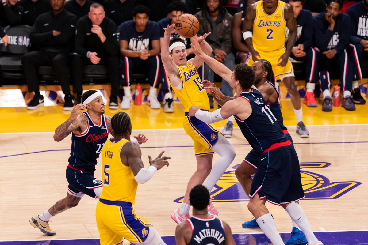 Austin Reaves #15 of the Los Angeles Lakers passes the ball during an NBA basketball game against the LA Clippers, Friday February 20, 2026 in Los Angeles, Calif.
